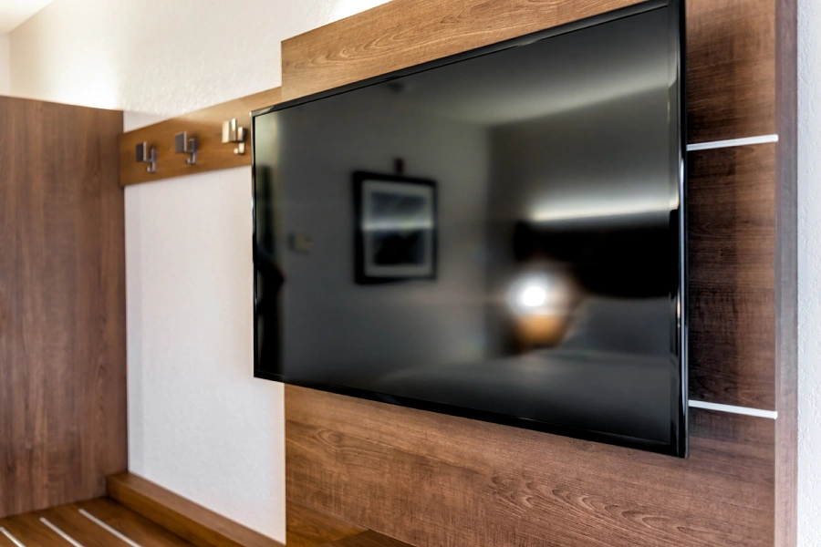 Clean TV wall-mount with hidden cables and soundbar integration